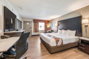 Rúm í herbergi á Quality Inn Poughkeepsie