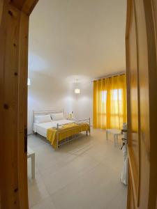 Un pat sau paturi într-o cameră la Villa Vistasalentina BIS Appartamento Delux
