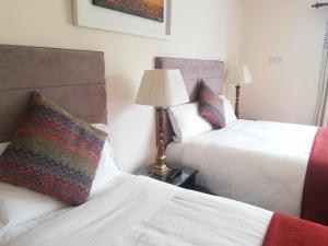 Voodi või voodid majutusasutuse O'Sheas Ceol Na Habhann B&B toas