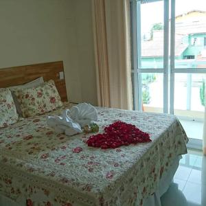 Een bed of bedden in een kamer bij Visual Mar Pousada