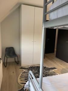 Postel nebo postele na pokoji v ubytování NEOZONE Appart-Hotel Malmedy