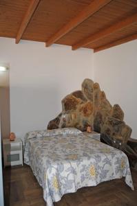 Un pat sau paturi într-o cameră la Casa Guanche