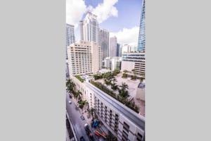 an aerial view of a city with a tall building at Spectacular Studio at Brickell, Free Parking in Miami