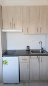 A kitchen or kitchenette at Kandis Place