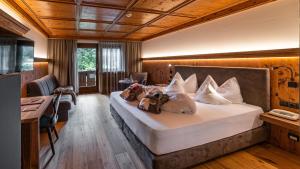 Posteľ alebo postele v izbe v ubytovaní Romantik Hotel Santer