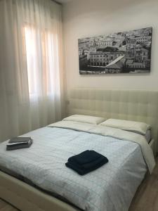 Vuode tai vuoteita majoituspaikassa ODA ROOMS BO - FIERA - CENTRO METEO EU - FICO EATALY