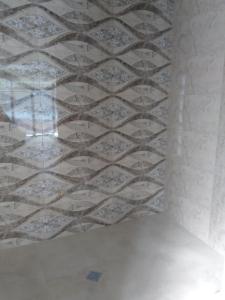 a coffered ceiling in a room with white tiles at Guesthouse Star Georgia in Tbilisi City