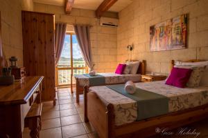 A seating area at Orchidea Xaghra