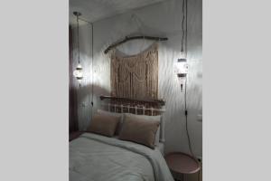 Postel nebo postele na pokoji v ubytování Σύγχρονο Vintage στο Μαρούσι