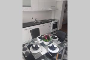 Kuchyň nebo kuchyňský kout v ubytování Milmar apartman