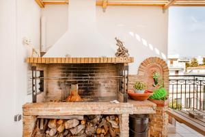 Balkón alebo terasa v ubytovaní Σοφίτα Μοναδικής Αύρας με Θέα & BBQ