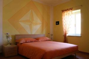 Postel nebo postele na pokoji v ubytování B&B 21