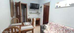 TV a/nebo společenská místnost v ubytování IERRE B&B il piacere dell accoglienza