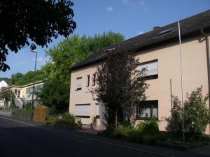 a building on the side of a street at Ferienwohnung Herrig in Treis-Karden