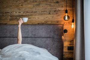 Postel nebo postele na pokoji v ubytování myLoisl Apartments