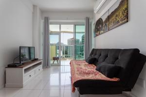 A seating area at Bora Bora Resort Barra da Tijuca