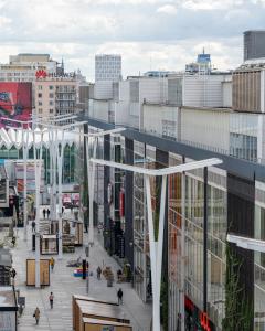 a view of a city with people walking on a street at ZGODA 13 P&O Serviced Apartments in Warsaw