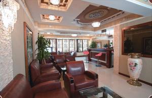 TV a/nebo společenská místnost v ubytování Hotel Bazaar