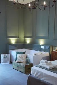 Krevet ili kreveti u jedinici u okviru objekta Dimora Terranova Charming Rooms