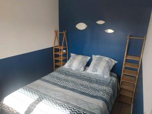Ένα ή περισσότερα κρεβάτια σε δωμάτιο στο Charmant appartement F2 neuf Patrimonio