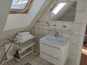 Koupelna v ubytování Zsanett Appartement + 28 fotografií