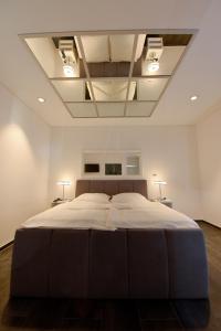 En eller flere senge i et værelse på Apartmani i Bungalovi TROJKA