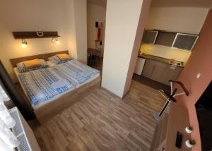 Katil atau katil-katil dalam bilik di Hotel Gól Prostějov