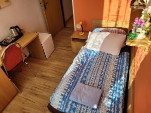 Katil atau katil-katil dalam bilik di Hotel Gól Prostějov