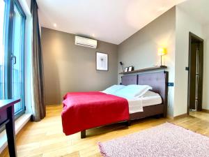 Postel nebo postele na pokoji v ubytování Villa FORTE-Exclusive location with fantastic seaview & infinity pool - up to 8 Pax
