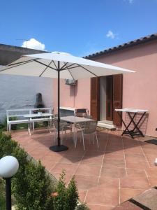 A patio or other outdoor area at La Dimora