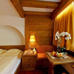 Postel nebo postele na pokoji v ubytování Hotel Bruno