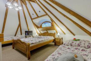 Кровать или кровати в номере Stara Plynarna