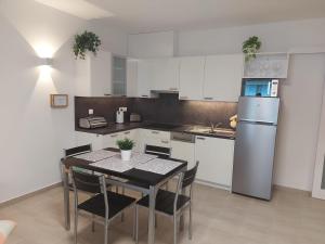 Kuchyň nebo kuchyňský kout v ubytování Apartmán Lipno s výhledem na jezero