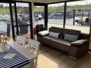 Posezení v ubytování Hausboot Casa di Lago