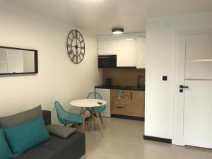 Kuchyň nebo kuchyňský kout v ubytování Apartamenty Chata u Rybaka