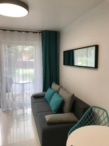 Posezení v ubytování Apartamenty Chata u Rybaka