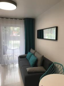 Posezení v ubytování Apartamenty Chata u Rybaka