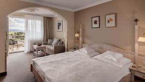 Ein Bett oder Betten in einem Zimmer der Unterkunft Hotel Almesberger