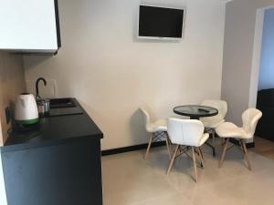 Kuchyň nebo kuchyňský kout v ubytování Apartamenty Chata u Rybaka