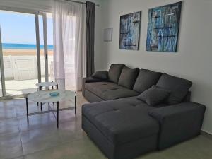 A seating area at Luxury Apartment On The Beach