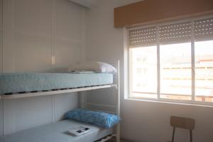 Cama o camas de una habitación en Albergue Santa Olaia