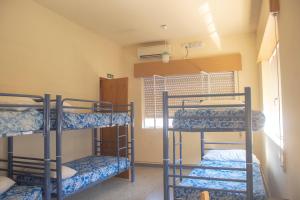 Postel nebo postele na pokoji v ubytování Albergue Santa Olaia
