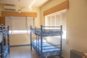 Cama o camas de una habitación en Albergue Santa Olaia