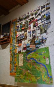 a collage of photos of various items on a wall at Hostel Bad Salzig in Boppard