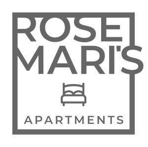 Um sinal que diz Rosie Marte apartamentos com uma cadeira em Rosemari's Apartments Republica em São Paulo