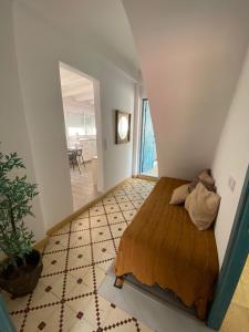 Ein Bett oder Betten in einem Zimmer der Unterkunft Blue Beach House ATICO CON TERRAZA