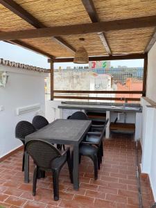 Ein Balkon oder eine Terrasse in der Unterkunft Blue Beach House ATICO CON TERRAZA