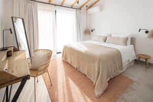 Tempat tidur dalam kamar di Casa Celeste by Sevencollection