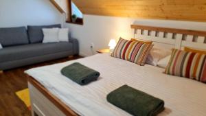 מיטה או מיטות בחדר ב-Chalet Laura