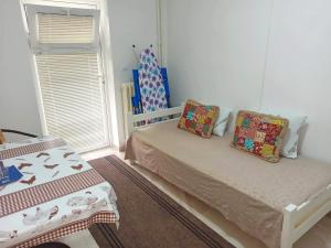 Cama ou camas em um quarto em Java apartments - S & J